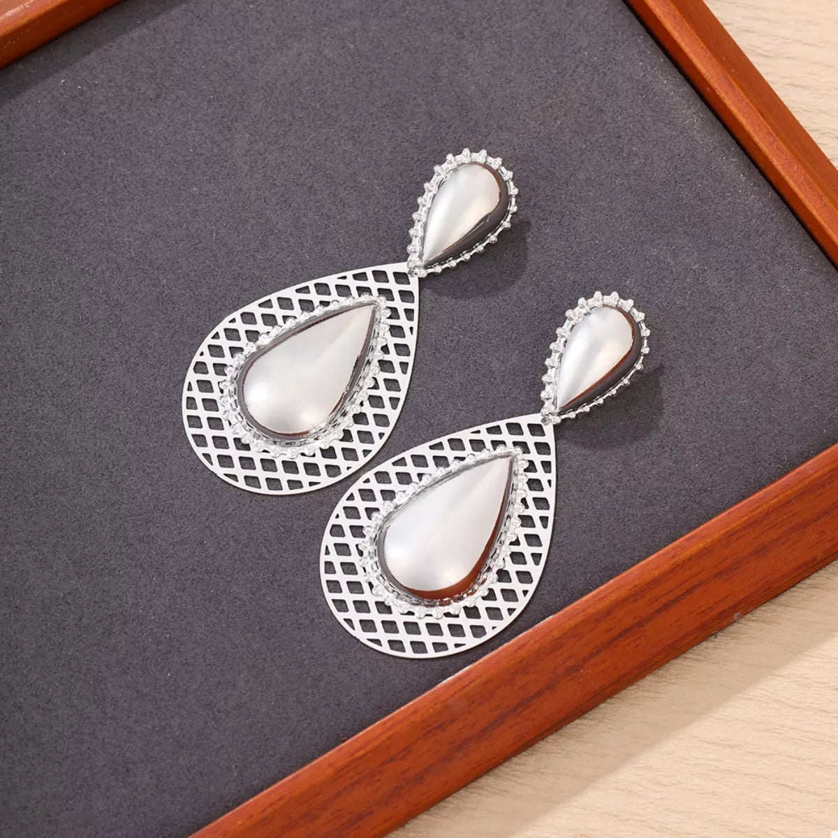 Hollowed-Out Teardrop Statement Earrings